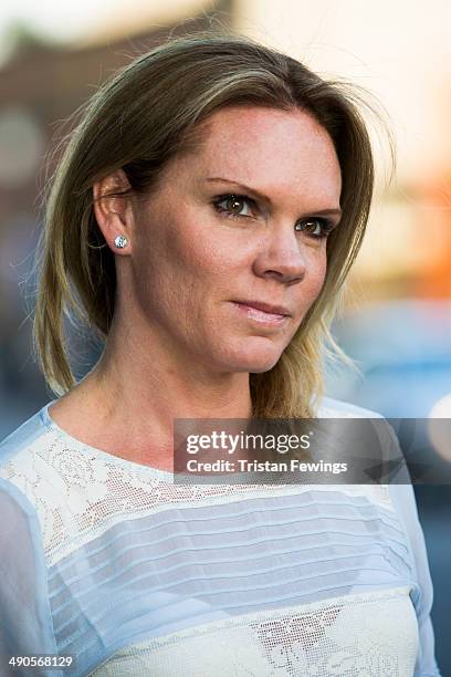 Louise Adams attends a photocall to launch the David Beckham for H&M Swimwear collection on May 14, 2014 in London, England.