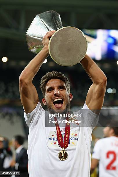 Daniel Carrico of Sevilla lifts the trophy during the UEFA Europa League Final match between Sevilla FC and SL Benfica at Juventus Stadium on May 14,...