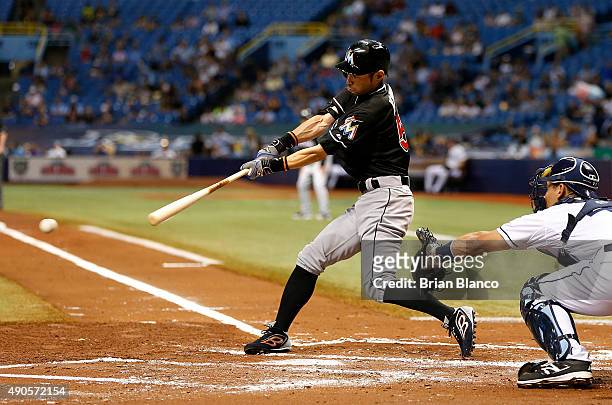 Ichiro Suzuki of the Miami Marlins grounds out in front of catcher Luke Maile of the Tampa Bay Rays to end the top of the second inning of a game on...