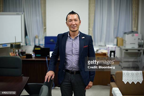 Kiyotaka Sasaki, secretary general of Japan's Securities and Exchange Surveillance Commission , poses for a photograph in Tokyo, Japan, on Tuesday,...