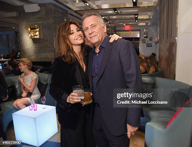 Actors Gina Gershon and Paul Reiser attend the Amazon red carpet premiere for the brand new original comedy series "Red Oaks" on September 29, 2015...