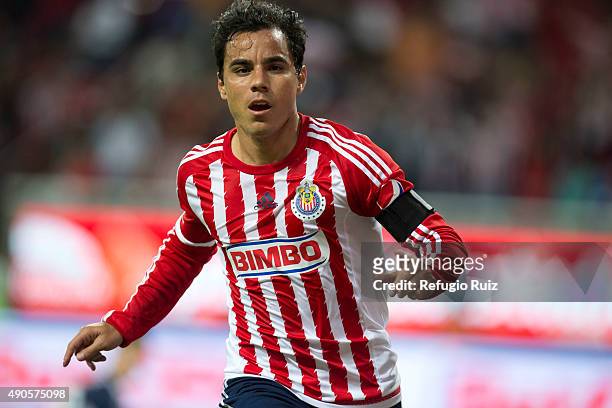 Omar Bravo of Chivas celebrates after scoring the first goal of his team during the 11th round match between Chivas and Monterrey as part of the...