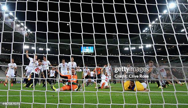 Sevilla players celebrate victory in front of their fans during the UEFA Europa League Final match between Sevilla FC and SL Benfica at Juventus...