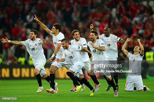 Sevilla players celebrate after Kevin Gameiro of Sevilla scores the winning penalty in the shoot out during the UEFA Europa League Final match...