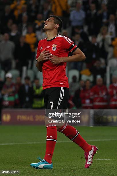 Oscar Cardozo of Benfica reacts after missing a penalty during the UEFA Europa League Final match between Sevilla FC and SL Benfica at Juventus...