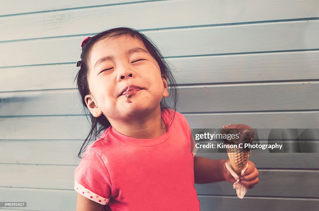 Toddler enjoying her ice-creme