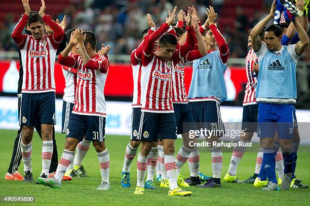 Players of Chivas celebrate after winning the 11th round match between Chivas and Monterrey as part of the Apertura 2015 Liga MX at Omnilife Stadium...