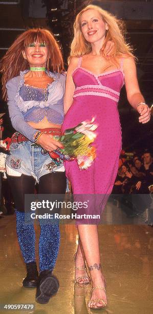 Betsey Johnson and daughter Lulu walk the runway during the Betsey Johnson Fashion Show in Bryant Park, New York, New York, 1990s.