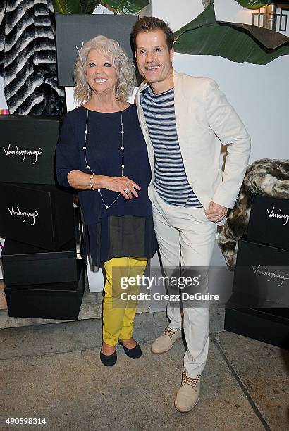 Celebrity chef Paula Deen and dancer Louis van Amstel arrive at the EVINE Live Celebration at Villa Blanca on September 29, 2015 in Beverly Hills,...
