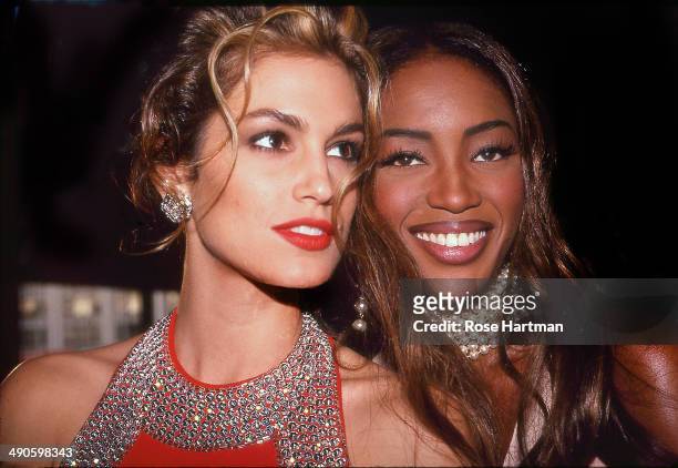 Models Cindy Crawford and Naomi Campbell attend a private party, New York City, New York, 1992.