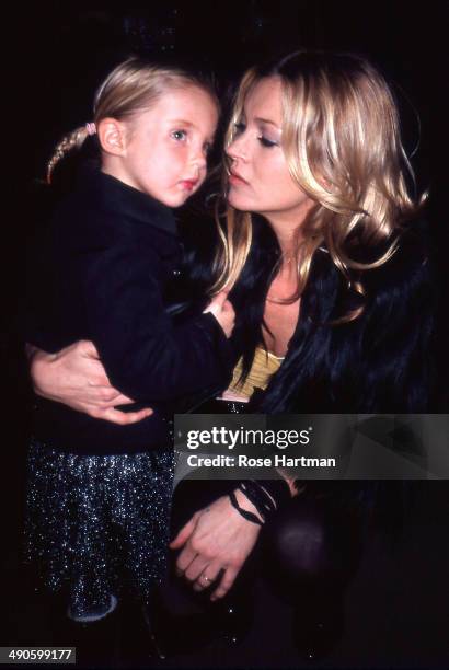 Kate Moss and daughter Lily attend an unidentified photo exhibition at the Milk Studios, 2006.