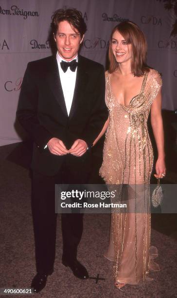 Actor Hugh Grant and actress Elizabeth Hurley attend the CFDA Awards at Cipriani, New York, New York, 1998.