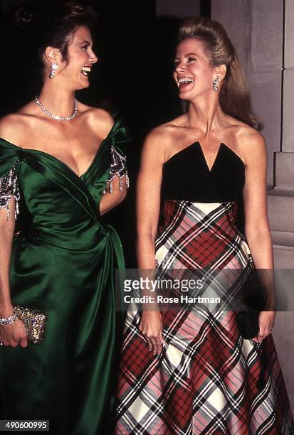 Linda Carter and Blaine Trump attend the Costume Institute Gala at the Metropolitan Museum, New York, New York, 1986.