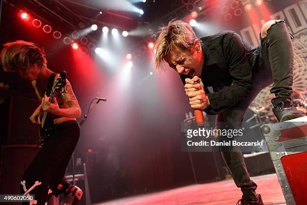 Ryota Kohama and Takahiro Moriuchi of One Ok Rock perform at House Of Blues Chicago on September 29, 2015 in Chicago, Illinois.