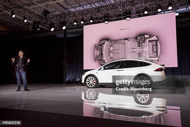 Elon Musk, chairman and chief executive officer of Tesla Motors Inc., unveils the Model X sport utility vehicle during an event in Fremont,...