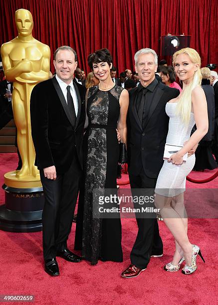 Director/writer Kirk DeMicco, Kacey DeMicco, director/writer Chris Sanders and Jessica Steele attend the Oscars held at Hollywood & Highland Center...