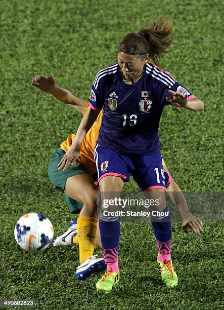 Rumi Utsugi of Japan in action during the AFC Women's Asian Cup Group A match between Australia and Japan at Thong Nhat Stadium on May 14, 2014 in Ho...