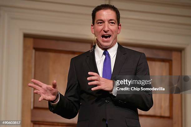 Author Glenn Greenwald speaks at a book discussion at the Sixth & I Historic synagogue May 14, 2014 in Washington, DC. Greenwald published National...