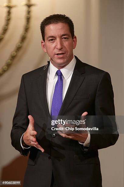 Author Glenn Greenwald speaks at a book discussion at the Sixth & I Historic synagogue May 14, 2014 in Washington, DC. Greenwald published National...