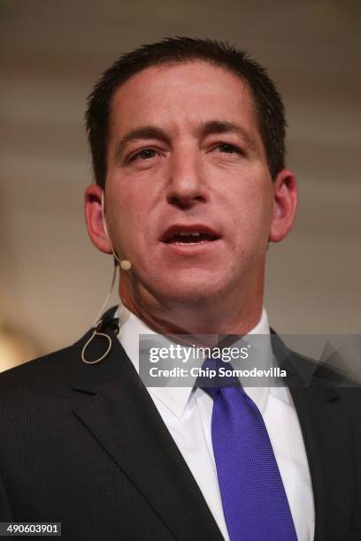 Author Glenn Greenwald speaks at a book discussion at the Sixth & I Historic synagogue May 14, 2014 in Washington, DC. Greenwald published National...