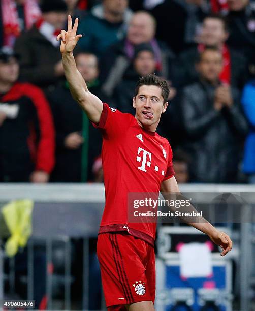 Robert Lewandowski of Bayern Muenchen celebrates scoring his teams fifth goal during the UEFA Champions League Group F match between FC Bayern...