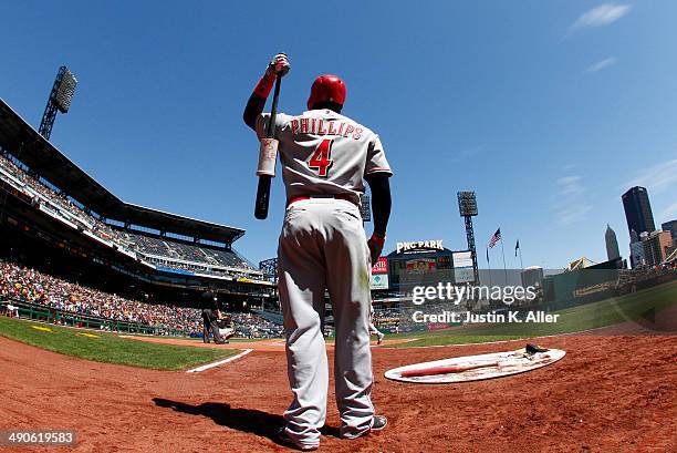 Brandon Phillips of the Cincinnati Reds on deck against the Pittsburgh Pirates during the game at PNC Park April 24, 2014 in Pittsburgh, Pennsylvania.