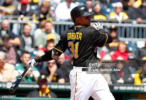Jose Tabata of the Pittsburgh Pirates bats against the Cincinnati Reds during the game at PNC Park April 24, 2014 in Pittsburgh, Pennsylvania.