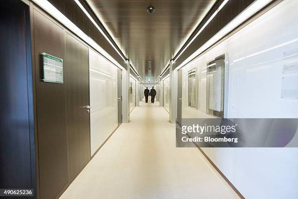 Offices line a corridor inside the Bundesbank, Germany's central bank, in Frankfurt, Germany, on Tuesday, Sept. 29, 2015. German business confidence...