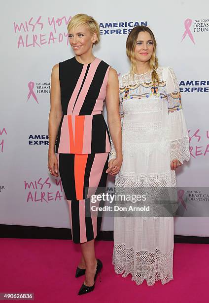 Toni Collette and Drew Barrymore arrive ahead of the 'Miss You Already' gala premiere at the State Theatre on September 30, 2015 in Sydney, Australia.