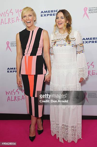 Toni Collette and Drew Barrymore arrive ahead of the 'Miss You Already' gala premiere at the State Theatre on September 30, 2015 in Sydney, Australia.