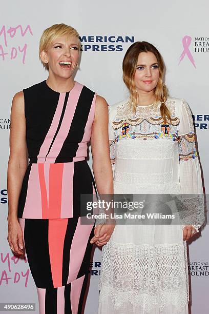 Toni Collette and Drew Barrymore arrive at the 'Miss You Already' Gala premiere at the State Theatre on September 30, 2015 in Sydney, Australia.