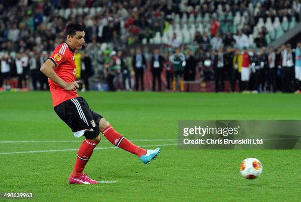 Oscar Cardozo of SL Benfica kicks his penalty that was saved during the UEFA Europa League Final match between Sevilla FC and SL Benfica at Juventus...
