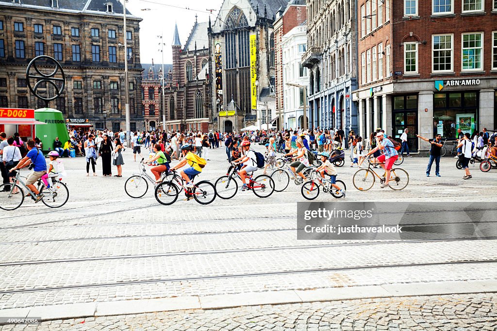 Many cycling kids in Amsterdam