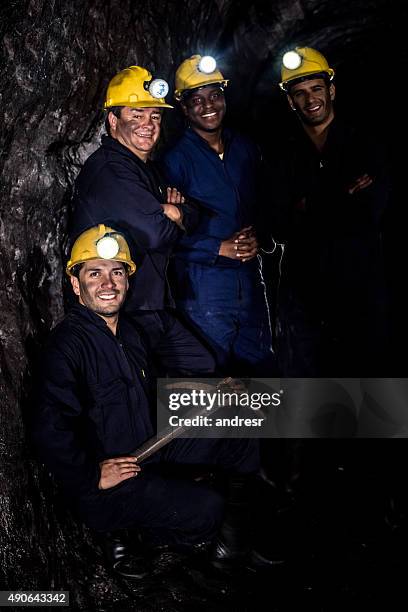 happy group of miners working - miner pick stock pictures, royalty-free photos & images