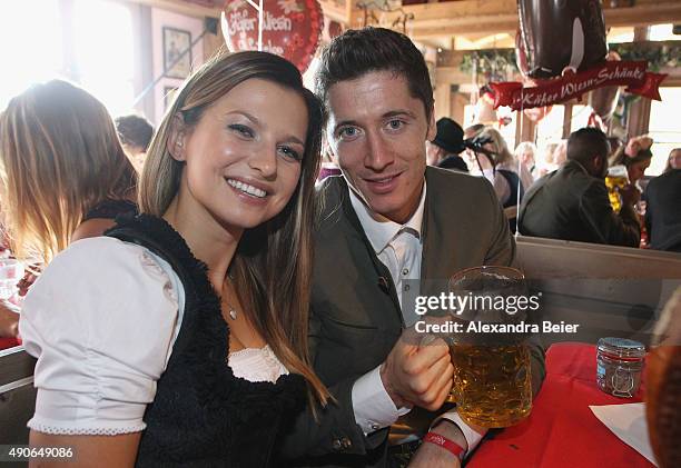 Robert Lewandowski of FC Bayern Muenchen and his partner Anna Stachurska attend the Oktoberfest beer festival 2015 at Theresienwiese on September 30,...