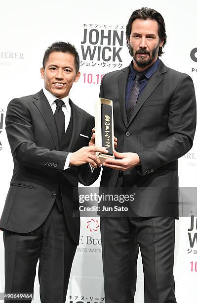 Keanu Reeves and judo competitor Tadahiro Nomura attend the 'John Wick' Japan Premiere at Differ Ariake Arena on September 30, 2015 in Tokyo, Japan.