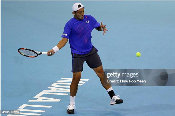 Tatsuma Ito of Japan competes against Nick Kyrgios of Australia during the 2015 ATP Malaysian Open at Bukit Jalil National Stadium on September 30,...