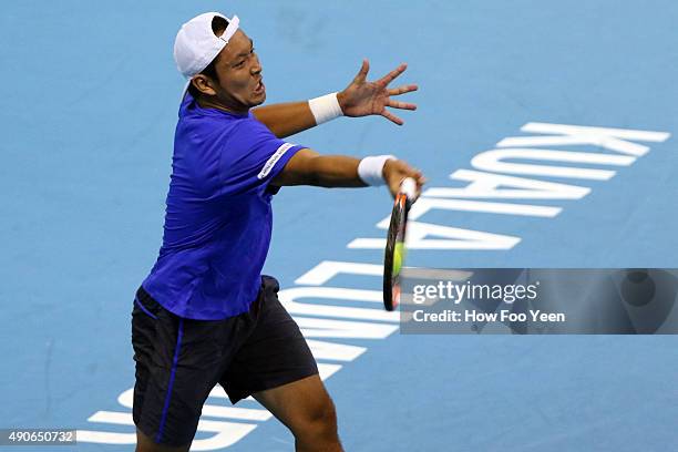 Tatsuma Ito of Japan competes against Nick Kyrgios of Australia during the 2015 ATP Malaysian Open at Bukit Jalil National Stadium on September 30,...