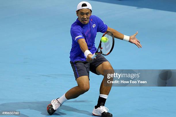 Tatsuma Ito of Japan competes against Nick Kyrgios of Australia during the 2015 ATP Malaysian Open at Bukit Jalil National Stadium on September 30,...