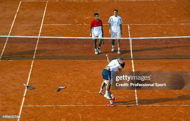 Xavier Malisse and Olivier Rochus of Belgium celebrate after winning their mens doubles final match against Michael Llodra and Fabrice Santoro of...