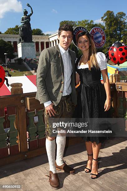 Robert Lewandowski of FC Bayern Muenchen attends with Anna Stachurska the Oktoberfest 2015 Beerfestival at Kaefer Wiesenschaenke at Theresienwiese on...