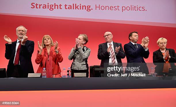 Labour leader Jeremy Corbyn applauds after singing "The Red Flag" on the final day of the Labour Party Autumn Conference on September 30, 2015 in...
