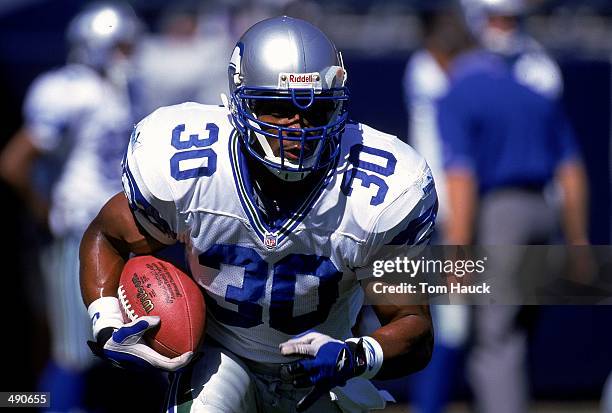 Ahmen Green of the Seattle Seahawks running with the ball during the game against the San Diego Chargers at Qualcomm Stadium in San Diego,...