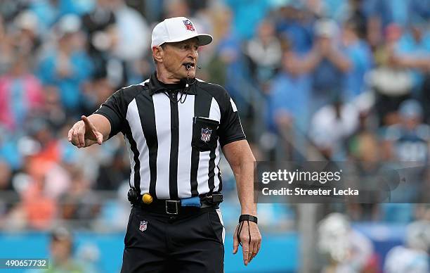 Referee Ed Hochuli during their game at Bank of America Stadium on September 27, 2015 in Charlotte, North Carolina.