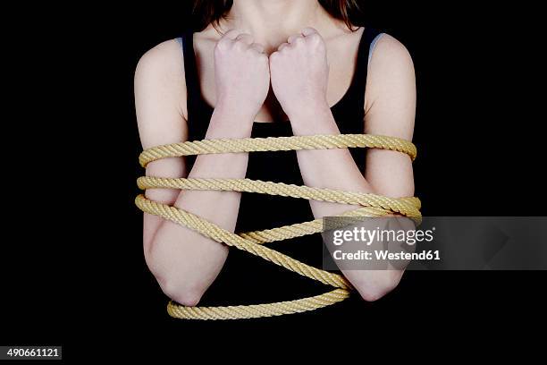 bounded young woman, midsection - tied up 個照片及圖片檔