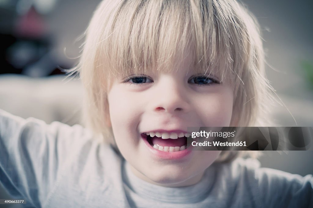 Happy blond boy, portrait