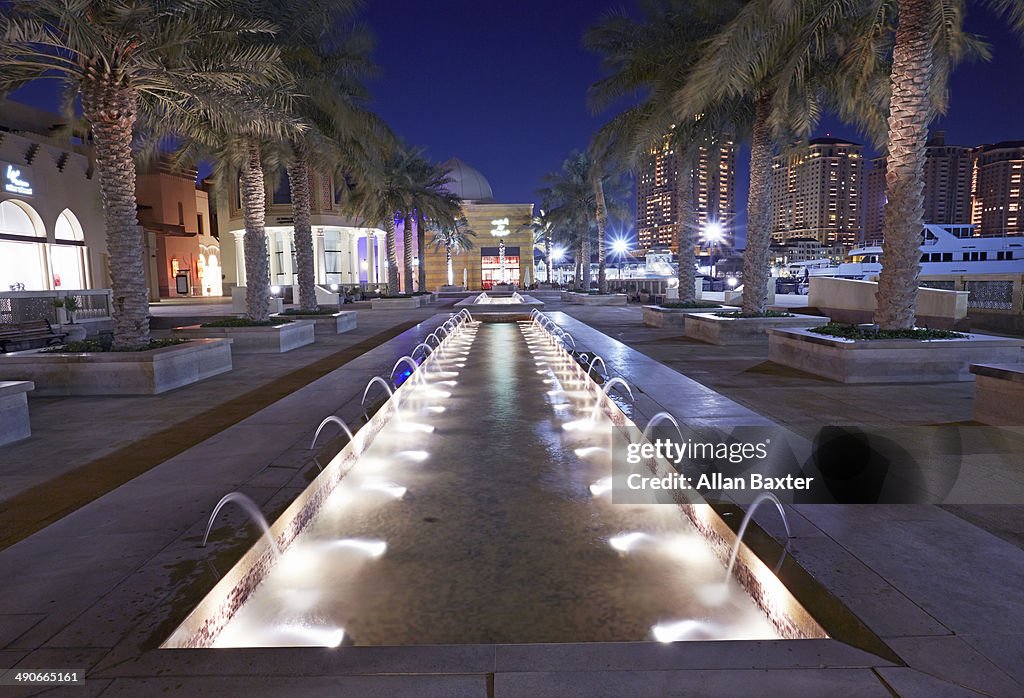 Fountain at night in Pearl marina in Doha