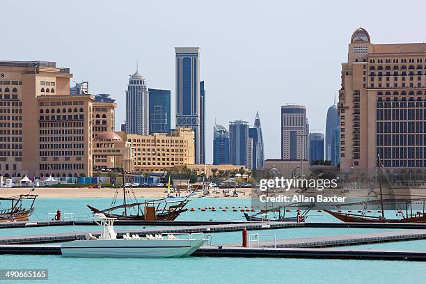 cityscape of diplomatic district of doha - dhow doha stock pictures, royalty-free photos & images