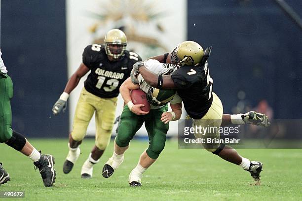 jashon-sykes-of-the-colorado-buffalos-tackles-a-player-during-the-game-against-the-colorado-state.jpg