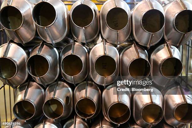 Completed automobile catalytic converter emission control devices, that contains platinum, sit in a trolley at BM Catalysts in Mansfield, U.K., on...